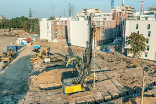 machine-drilling-holes-ground-then-pouring-concrete-foundations-piles