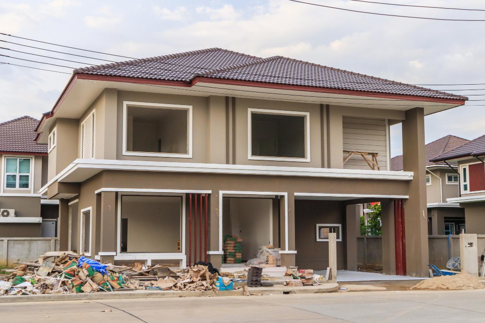 construction-residential-new-house-progress-building-site-with-clouds-blue-sky